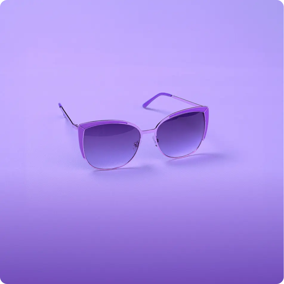 Sunglasses with purple frames and purple lenses representing sensitivity to light